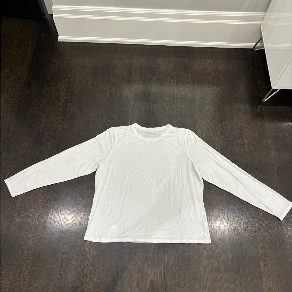 Babaton white longsleeve tee. Super soft. Never worn. Perfect condition.